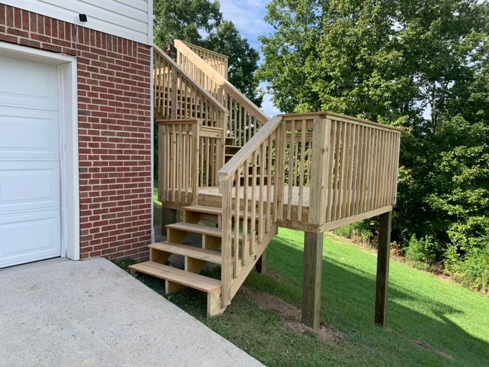 Custom deck stairs and railing built by Hunter Exteriors Chattanooga TN