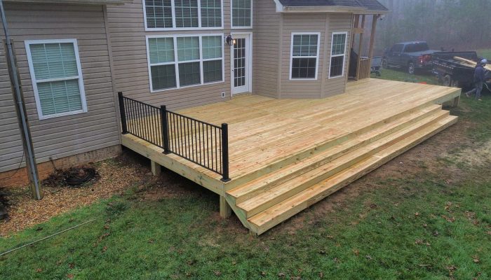 Deck installation on a residential home in Tennessee.